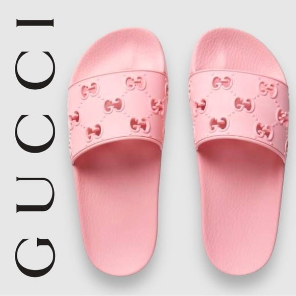 New authentic Gucci rubber slides in pink