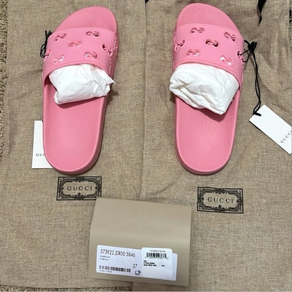 New authentic Gucci rubber slides in pink