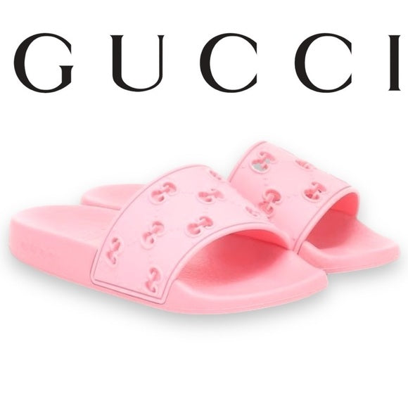 New authentic Gucci rubber slides in pink